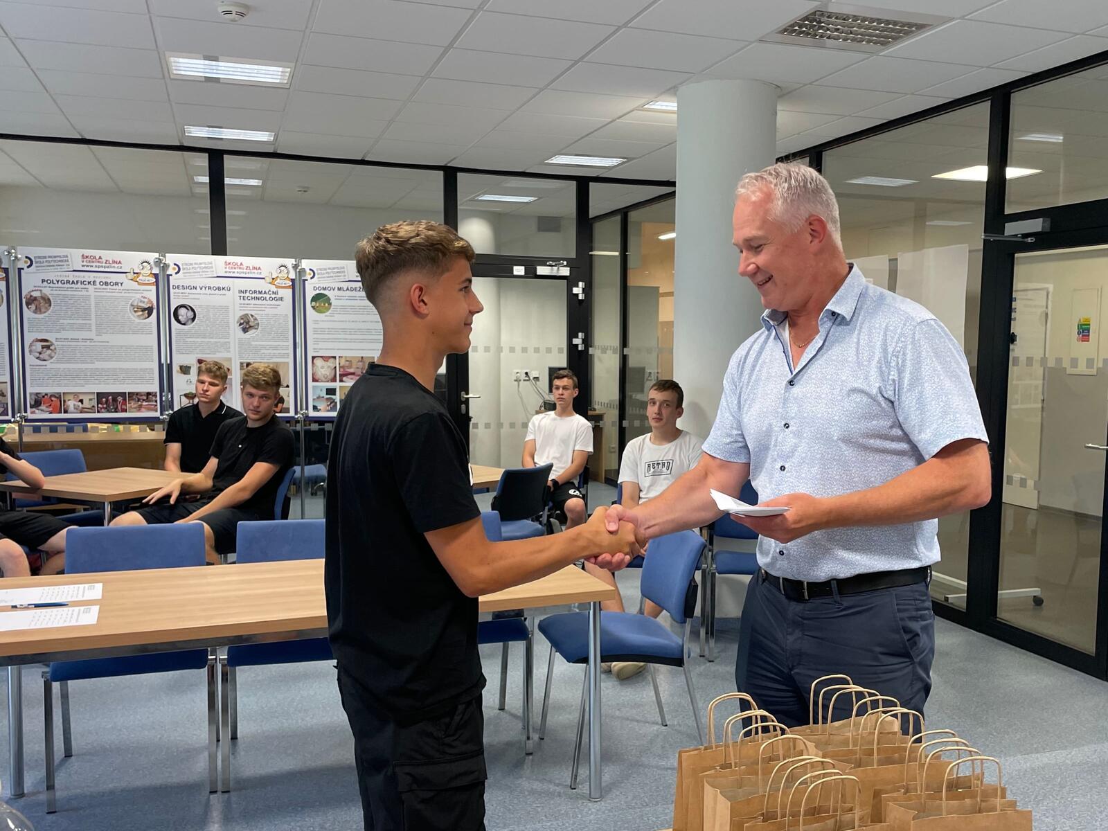 We handed out merit scholarships to students